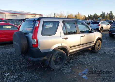 2006 Honda Cr-V Lx z USA, uszkodzony, nr VIN JHLRD78516C061422